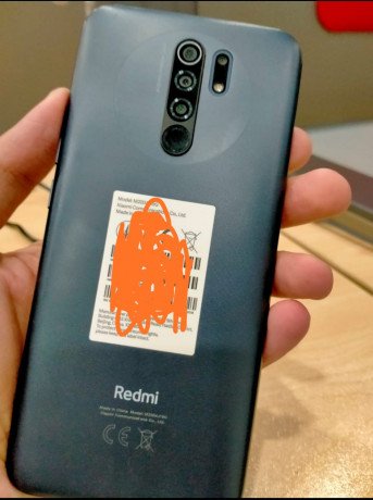 redmi-9-with-box-and-charger-big-0